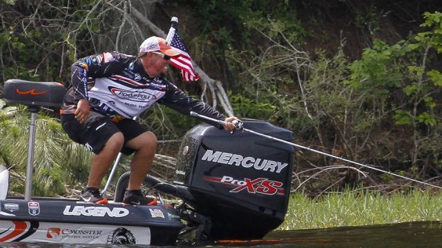 In his excellent photo blog on Bassmaster.com Ronnie Moore shows us how Chris Lane is hanging on for a white knuckle ride as he chases Kevin Van Dam on Toledo Bend . . .
